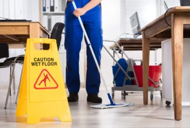 Cleaner cleaning the floor in a Nairobi office, S & M Cleaners office cleaning company